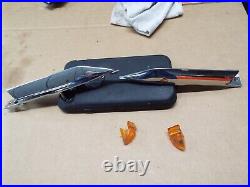 60 Cadillac NOS TOP OF FENDER TURN SIGNAL GUNSIGHT LIGHT BEZEL TRIM R&L