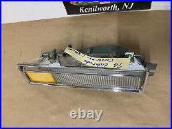 OEM 76 Cadillac Eldorado LEFT FRONT FENDER CORNERING TURN SIGNAL PARK LIGHT LENS